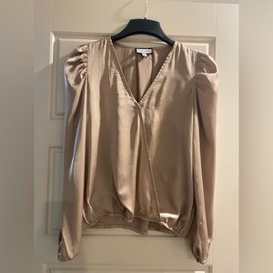 Beautiful gold blouse.